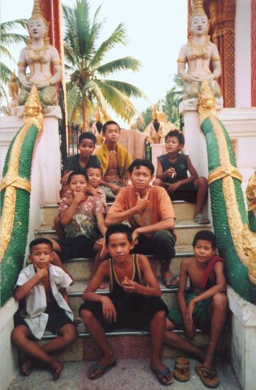 Lao Boys at a Wat ( Buddhist Temple ) in Vientiane - capital city of Laos