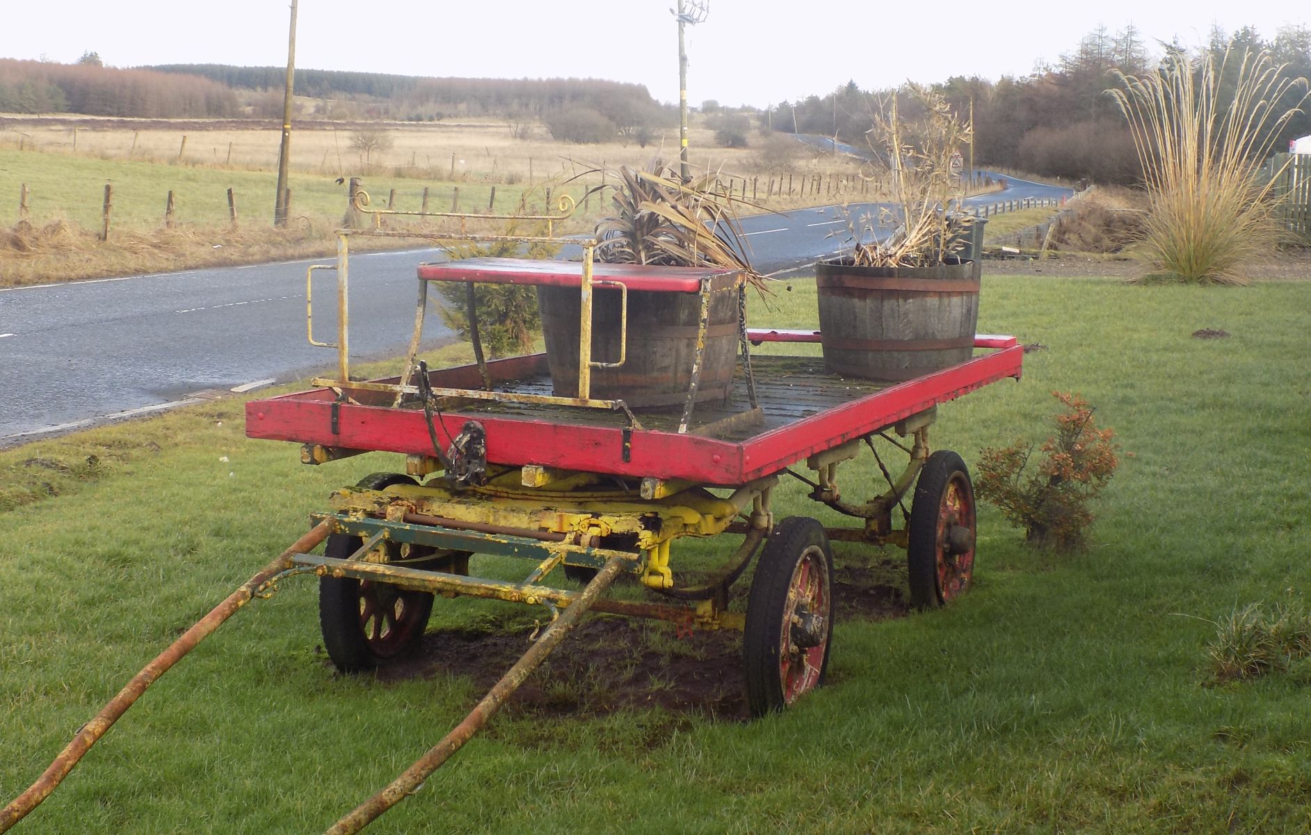 Ornamental trailer on road around loch