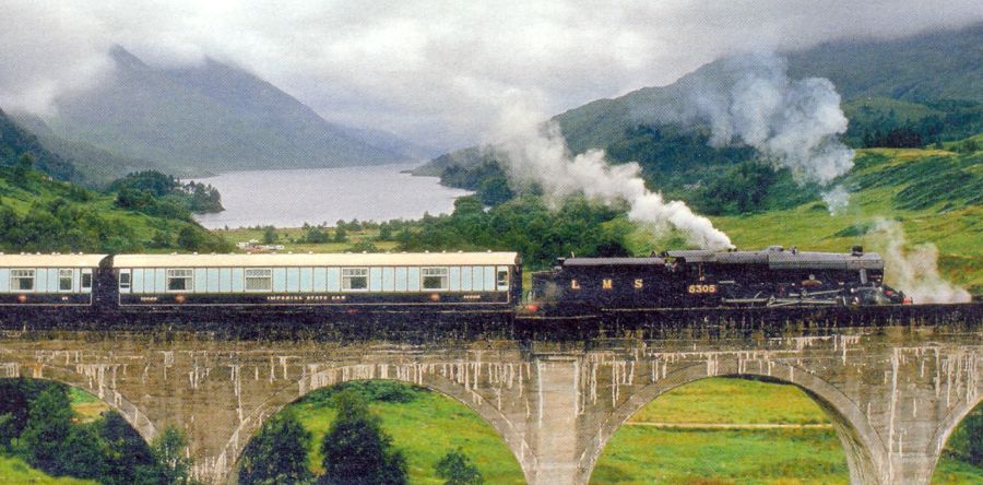 Steam Train on Glenfinnan Viaduct in Lochaber in Western Scotland