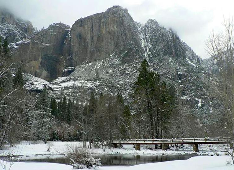 Yosemite Falls above Merced River in Yosemite Valley